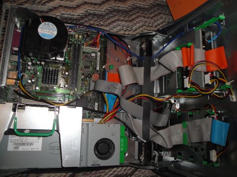 1993 Ford Taurus - The internal components of a desktop computer, including the motherboard, fan, and various cables.