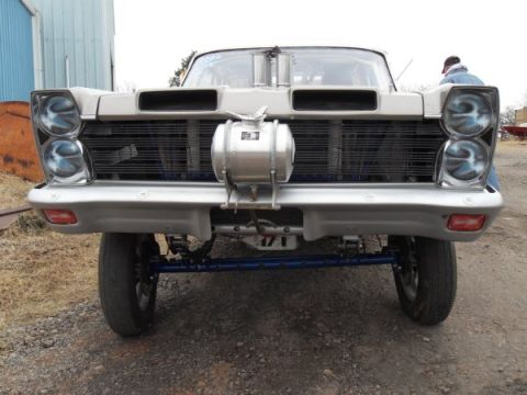 1963 Ford Fairlane - This 1963 Ford Fairlane has been modified for drag racing, evident from its aggressive front-end modifications and suspension.