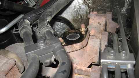 1997 Dodge 2500 - Close-up view of exhaust manifold and turbocharger components, with visible Supermotors.net watermark.