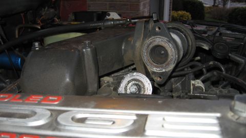 1997 Dodge 2500 - Close-up view of engine components, including a removed manifold and associated hoses and wiring.