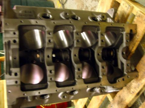 1972 Ford Ranchero - Machined V8 engine block shot straight down into the open bottom end, showing all eight honed cylinder bores with crosshatch, the main bear…