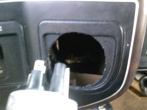 1990 Ford Bronco - A hole is cut into the dashboard, ready for a new gauge installation.
