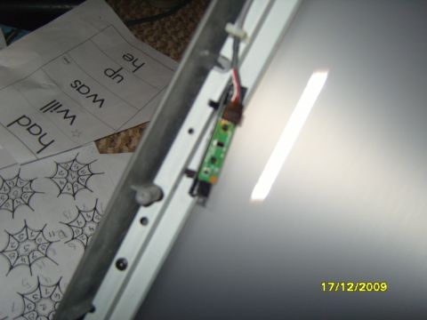 1989 Ford Bronco - Close-up of electronic components and papers with text and drawings.