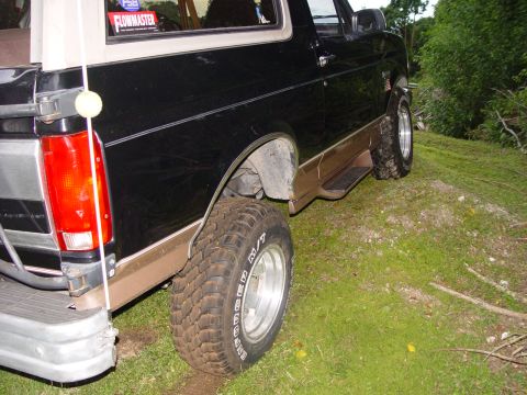 1996 Ford Bronco - This Ford Bronco has a two-tone paint scheme and off-road tires.