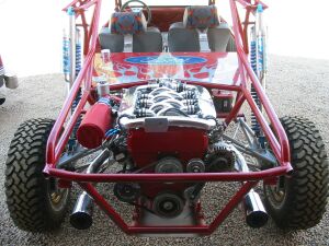 1993 Ford Taurus - This dune buggy features a prominent V8 engine and off-road tires, with a SuperMotors.net watermark visible.