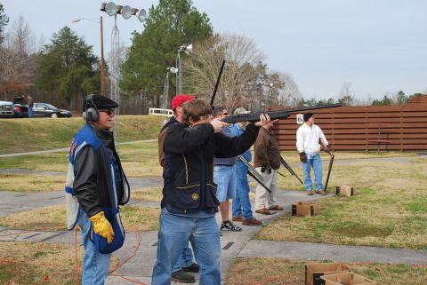 1979 Ford F-150 - Participants practice their aim at an outdoor shooting range.