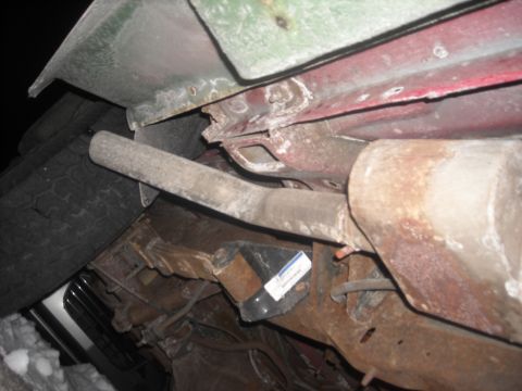 1995 Ford Bronco - pass side exit from underneath (it's the same as the drivers side)