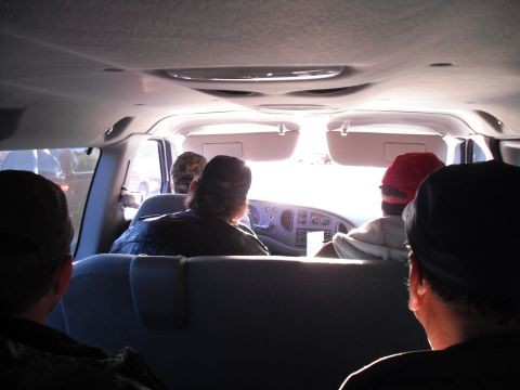 1991 Ford Bronco - Passengers in a van, looking towards the dashboard and windshield.