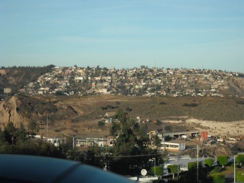 1991 Ford Bronco - View of a densely populated hillside town with industrial areas in the foreground.