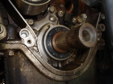 1992 Ford Taurus - Engine crankshaft seal area showing wear and potential oil leaks.