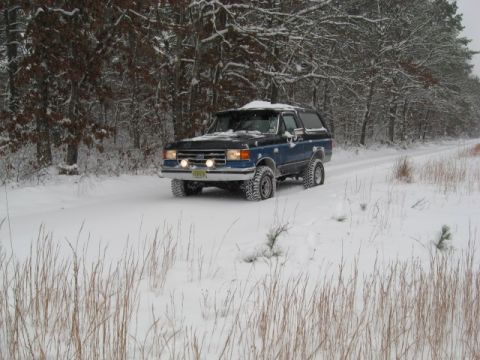 1990 Ford Bronco - First snow fall of winter 09. Daughter & I having fun cruising down the trails of south Jersey.