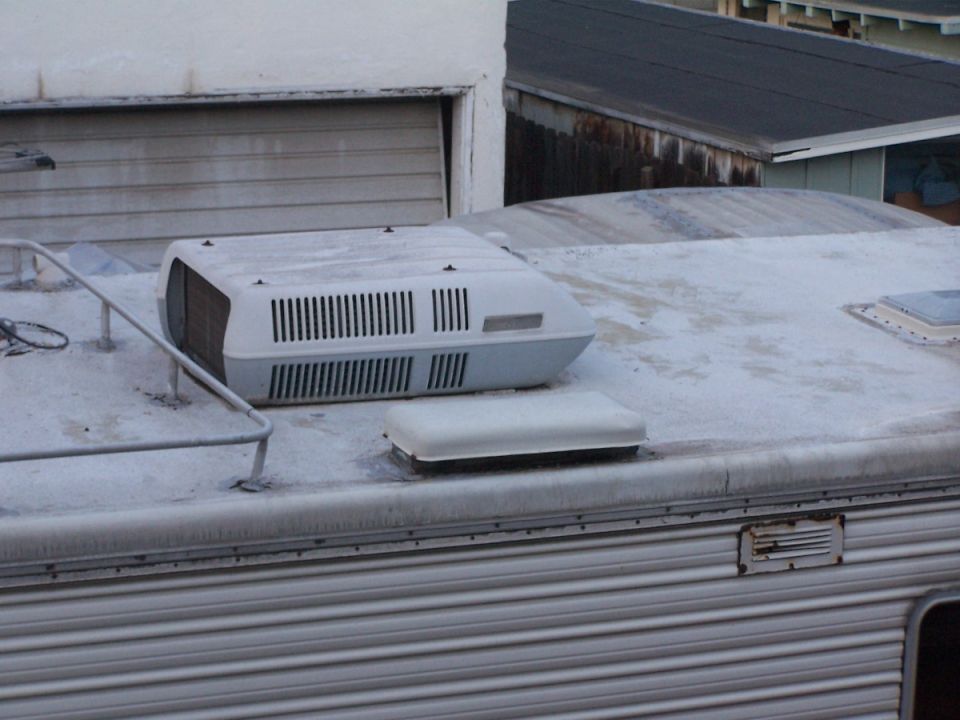 White rooftop air conditioner on an RV/trailer roof