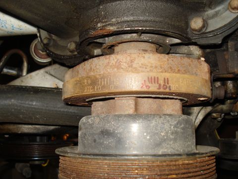 1991 Ford Bronco - Close-up of an engine pulley showing timing marks and numerical indicators.