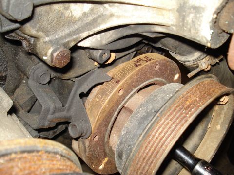 1991 Ford Bronco - Engine crankshaft pulley shows timing marks and wear.