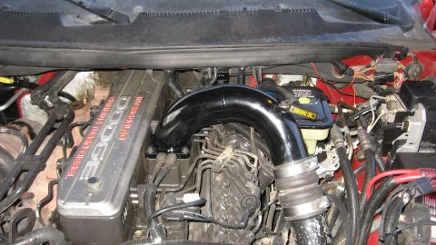 1997 Dodge 2500 - Close-up of a Dodge 5.9L Cummins Turbo Diesel engine, an aftermarket intake system and visible engine components.