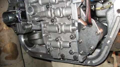 1997 Dodge 2500 - Detailed view of a transmission valve body, showing intricate internal components and hydraulic passages.