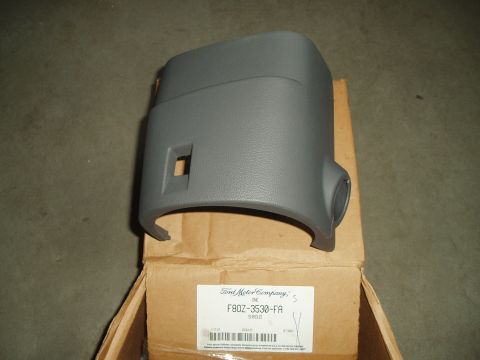 2003 Ford Crown Victoria - floor shift steering wheel shroud top. this is the paint to match part number, its primed and ready for paint. part number: F8OZ-3530-FA