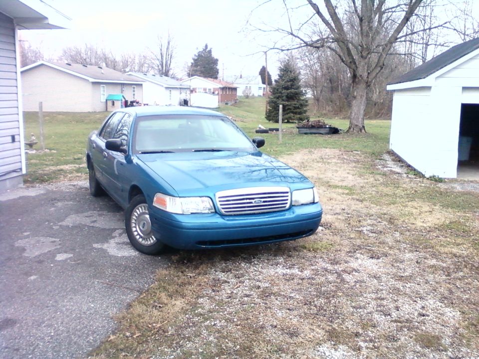 Blue 1998 Ford Crown Victoria front 3/4 view