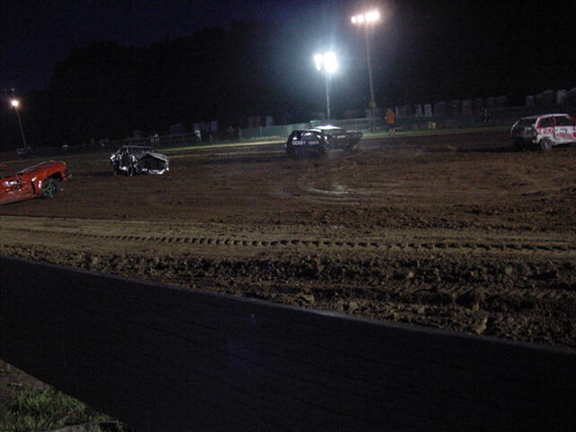 And yes, that IS a Geo Metro in the feature.  Only three cars were in the 4-cylinder heat, so they all made into the feature.  He didn't last more than one hit.  Then he got scared, waved at the flag guy and said his car was on fire, so they would stop the derby.  He jumped out of the car and off the pit.  I can't blame him.