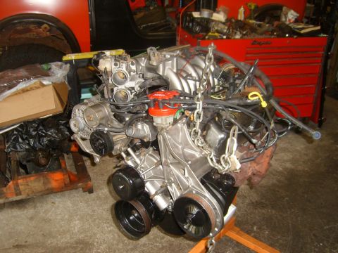 1994 Ford Bronco - Engine assembly on a stand, ready for installation or rebuild.