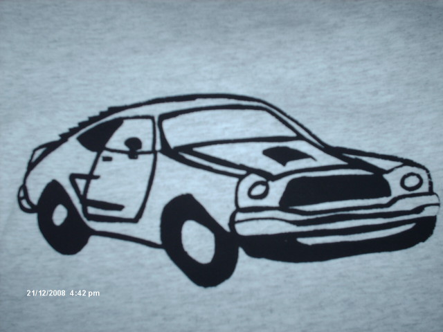 Line drawing of a car on a gray t-shirt. Date and time stamp in lower left