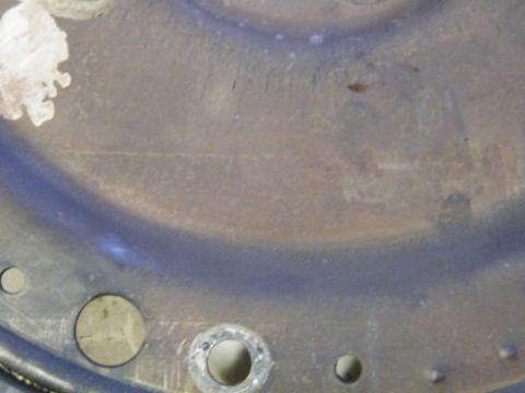 1982 Ford Bronco - A close-up view of a metal part, possibly from a vehicle's drivetrain or chassis.