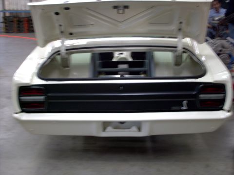 1963 Ford Fairlane - Rear view of a 1963 Ford Fairlane, showing the open trunk and distinctive taillights.
