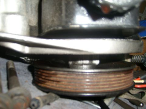 1994 Ford Bronco - Close-up view of a grooved pulley, likely from an engine compartment.