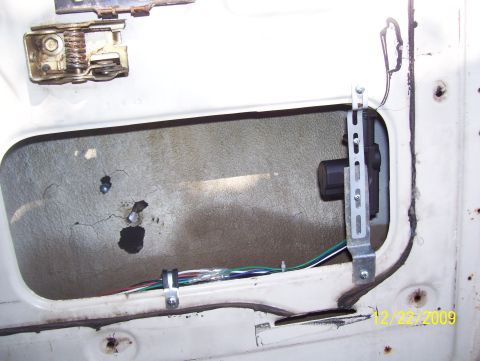 1978 Ford Bronco - Close-up view of the internal door latch assembly and wiring harness.