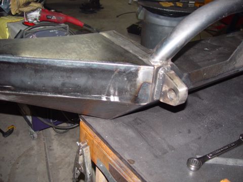 1993 Ford Bronco - Close-up view of a custom-fabricated bumper section, showing welding details and attachment points.