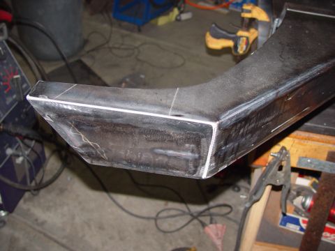 1993 Ford Bronco - Welded steel tubing section in a workshop, showing fabrication work.