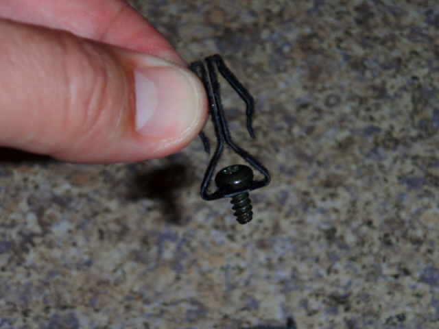 The clip can now seperate and a screw can be placed like so.