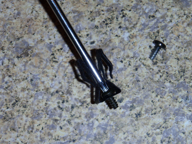 Another view, you can see how the screwdriver fits.  In my case, i was using torx headed screws, because they were what fit the best.