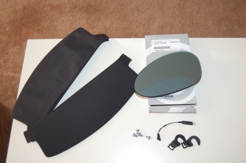 2002 BMW M3 - BMW side mirror and two sun visors laid out with screws and wiring.