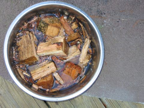 1992 Ford Bronco - Wood chips are soaking in a metal bowl, likely for smoking food.