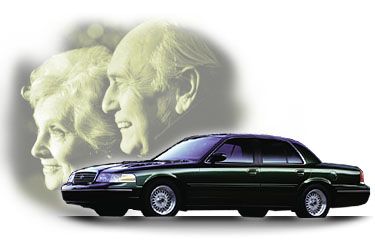 2000 Mercury Grand Marquis - A dark green 2000 Mercury Grand Marquis sedan is shown with a superimposed image of an elderly couple.