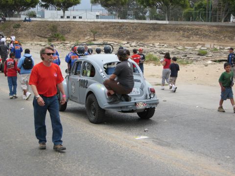 1986 Ford Bronco - A modified Volkswagen Beetle is seen from the rear, possibly at a racing event.