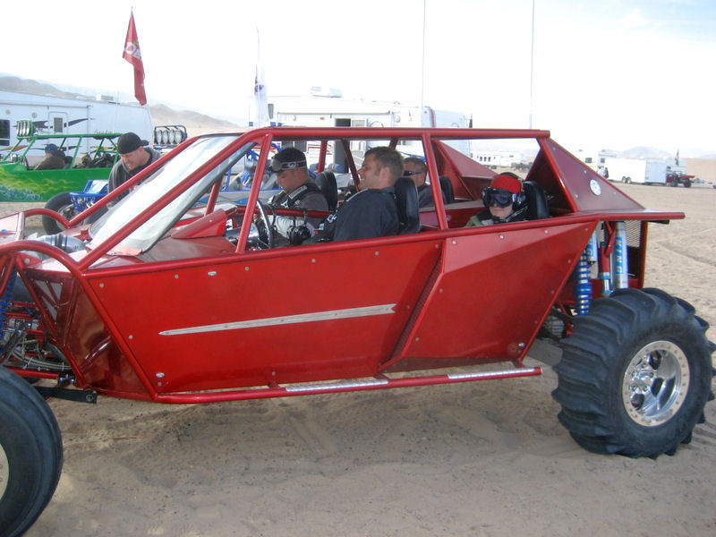 Red tube-chassis sand rail buggy on the dunes