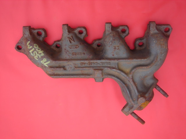 Used cast iron exhaust manifold with Ford casting numbers, marked TR 460