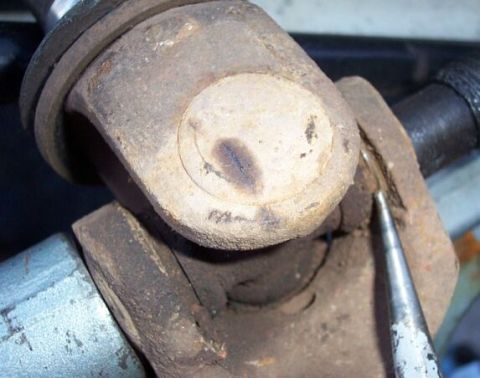 1990 Ford Bronco - This on a D44 front axleshaft; 5-297X u-joints. First you must remove the inner snap ring - it can be hard to see, but will push off with a…