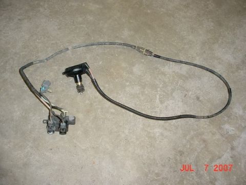 2007 Ford Mustang - This image shows an automotive part with wires and connectors, with a date stamp of JUL 7 2007.