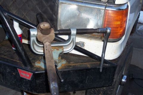 1990 Ford Bronco - I much prefer to use my ball joint press in my vise. These go on sale at Harbor Freight for $30 and are worth their weight in gold.