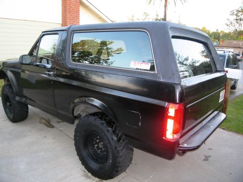 1986 Ford Bronco - This black Ford Bronco appears to be from the 1987-1991 generation, not a 1986 model.