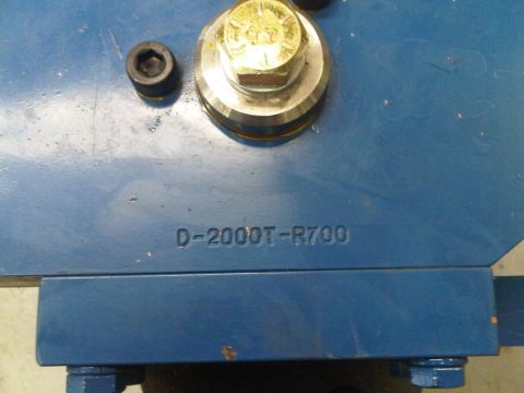 1996 Ford Bronco - Close-up of a blue metal component showing the stamped identifier D-2000T-R700.