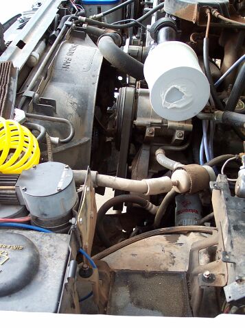 1990 Ford Bronco - Slipped some old pantyhose over the filter for a bit more protection. Also note all the new-found room in my engine compartment
