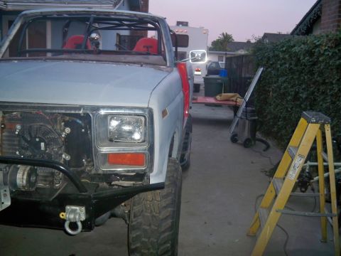1985 Ford Bronco - This heavily modified Ford Bronco appears to be undergoing a rebuild, with its front end partially disassembled.