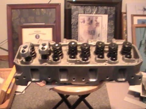 1971 Ford Mustang - Close-up view of an engine cylinder head, showing valve springs and rocker arms.