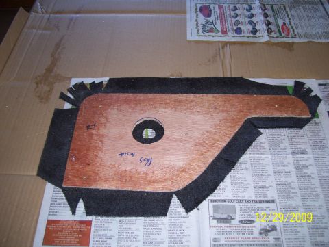 1978 Ford Bronco - Custom interior door panel part, likely for a classic vehicle, is shown with wood backing and carpeted edges.