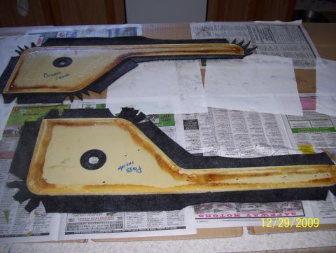 1978 Ford Bronco - Two door panels, labeled 'Driver' and 'Pass', are laid out on newspapers.