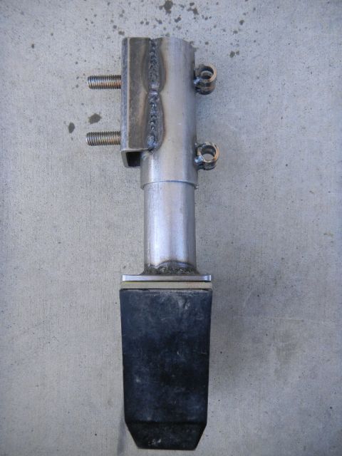 1997 Ford Ranger - A custom metal fabricated part with a rubber base and threaded bolts is shown against a concrete background.